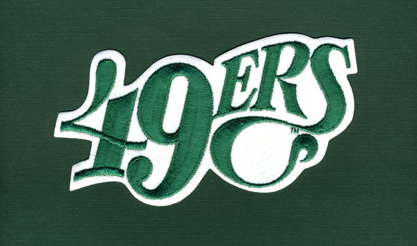 Badge with 49ers written on it.