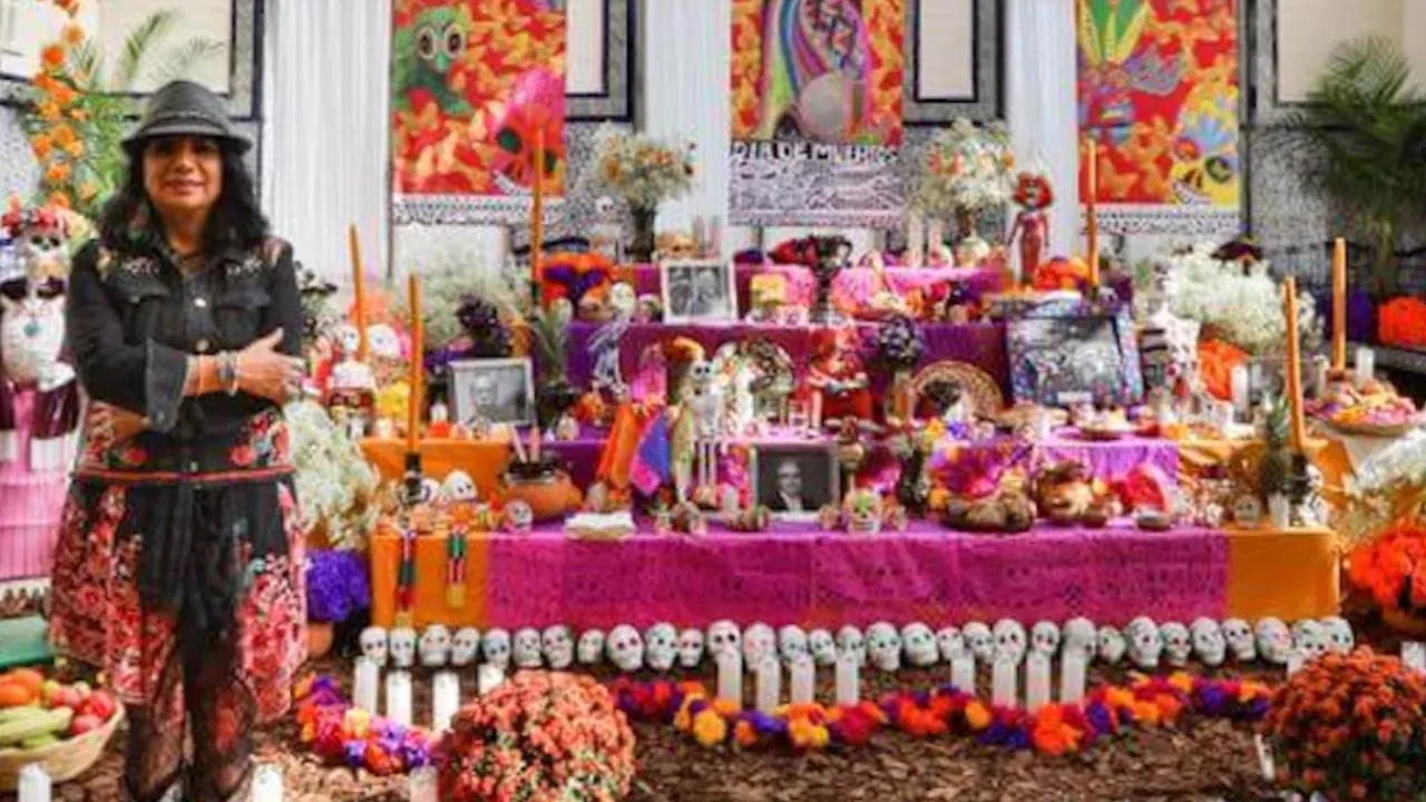 Rosalia Torres Weiner next to her Ofrenda in 2017 at the Mexican Cultural Institute in Washington D.C. (Photo by Sergio Ochoa courtesy of Torres Weiner)