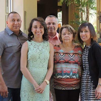 Brittany Hunt standing with family.