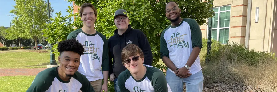 Housing and Residence Life Student Street Team posing for group pic