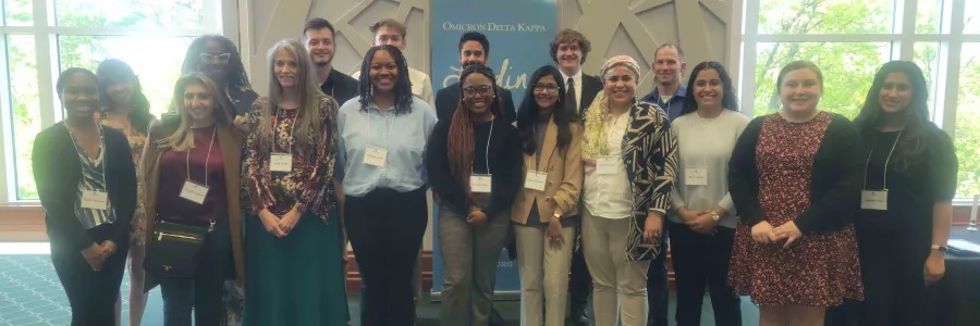 New members of Omicron Delta Kappa smiling at the spring initiation.