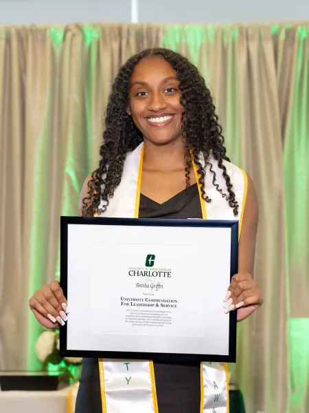 Anisha Griffin with award