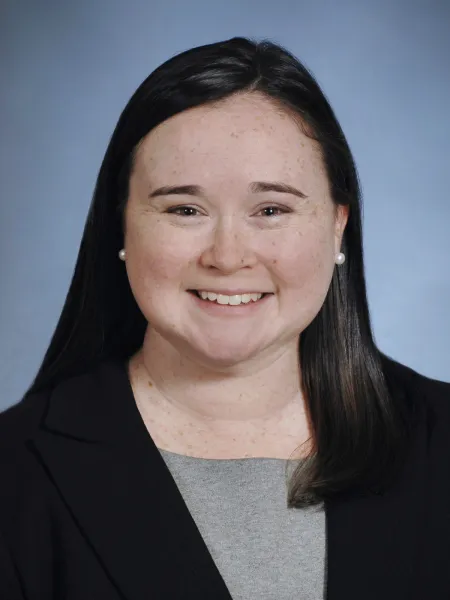 Ashley McAlarney smiling for a headshot