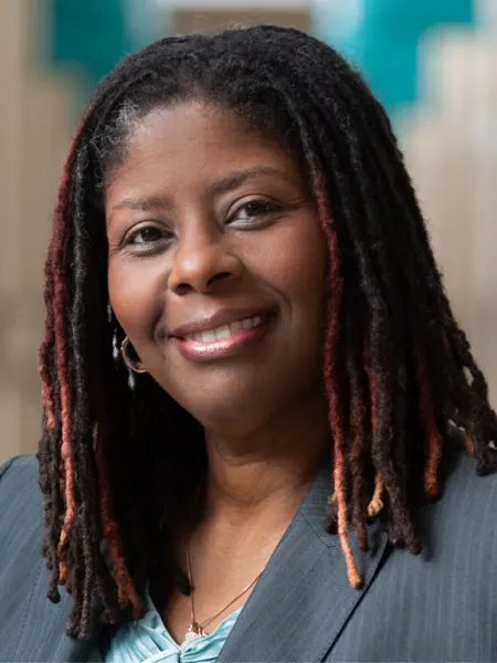 Headshot of Dr. Re'Shanda Grace-Bridges smiling