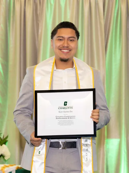 Hector Bautista-Don with award