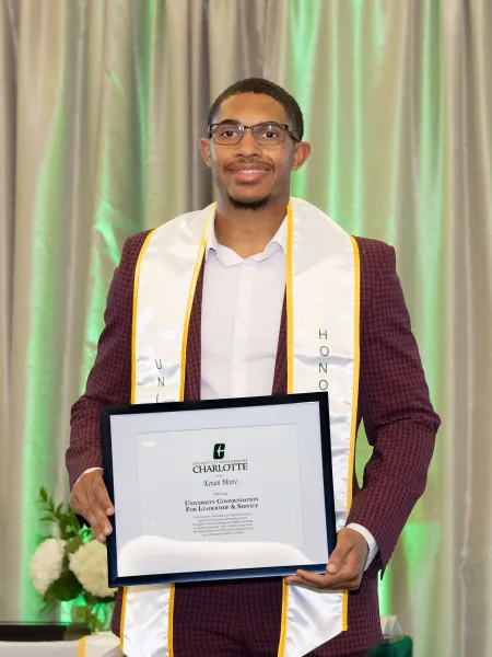 Kenan Moore with Award