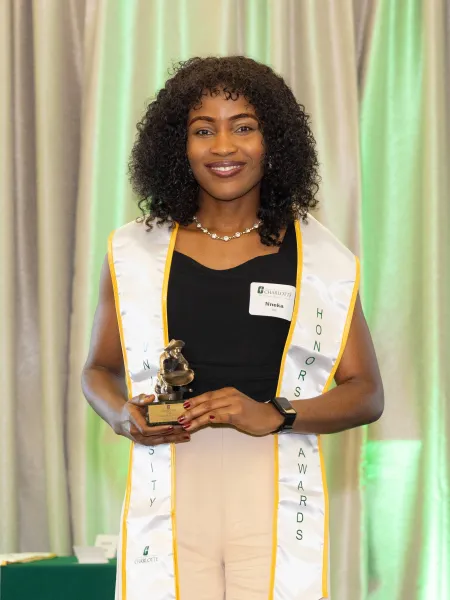 Nneka Ubi with award