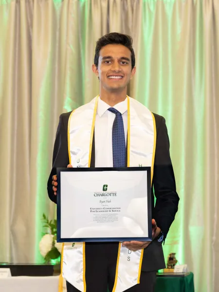 Ryan Shah with award