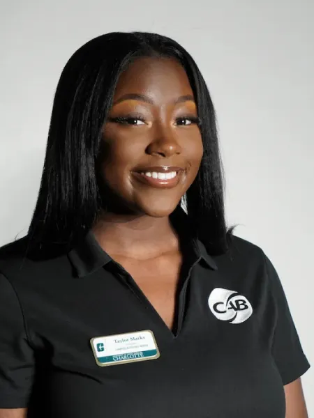 Taylor Marks smiling in her CAB uniform