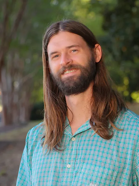 Max Hofmann smiling outside