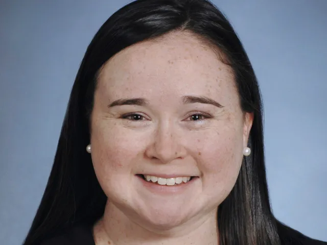 Ashley McAlarney smiling for a headshot