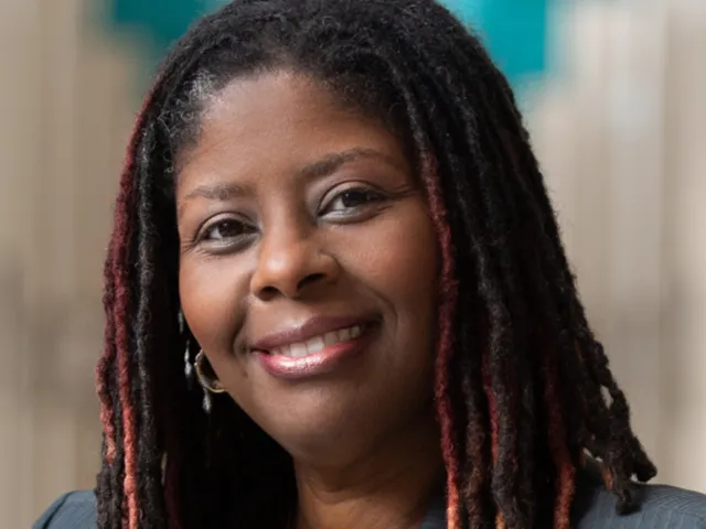 Headshot of Dr. Re'Shanda Grace-Bridges smiling