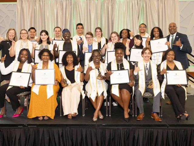 The 20 students, Chancellor Gaber and Vice Chancellor Bailey at the 2024 Honors and Awards ceremony