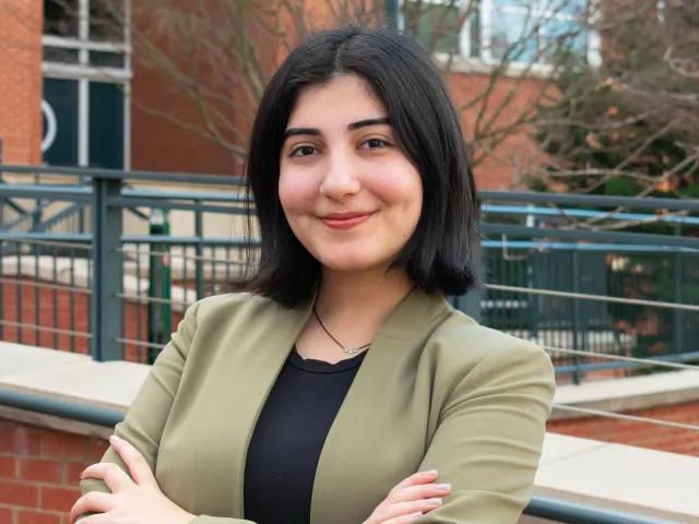Sunnya Hadavi crossing her arms in a blazer