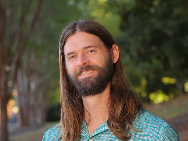 Max Hofmann smiling outside