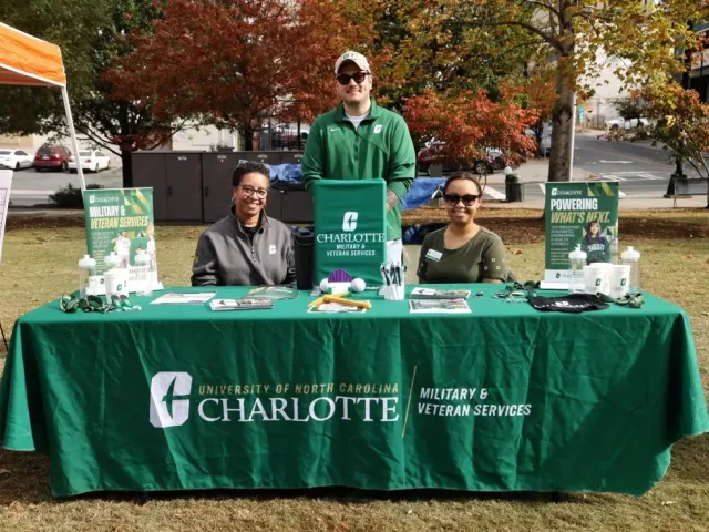 Military & Veteran Services outside at a table