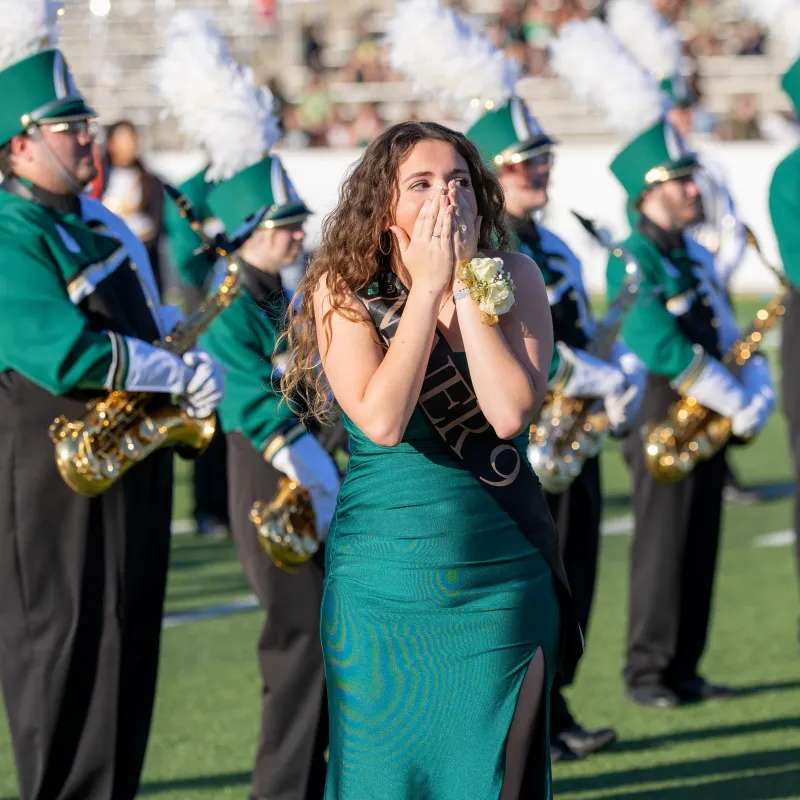 Abby Grace Bare with her hands over her mouth in shock after being named Golden Niner