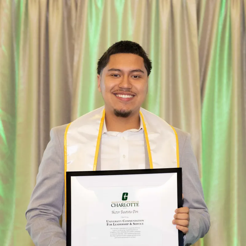 Hector Bautista-Don with award