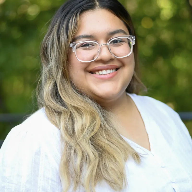 Jackie Gonzalez smiling for a headshot photo