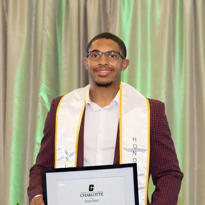 Kenan Moore with Award